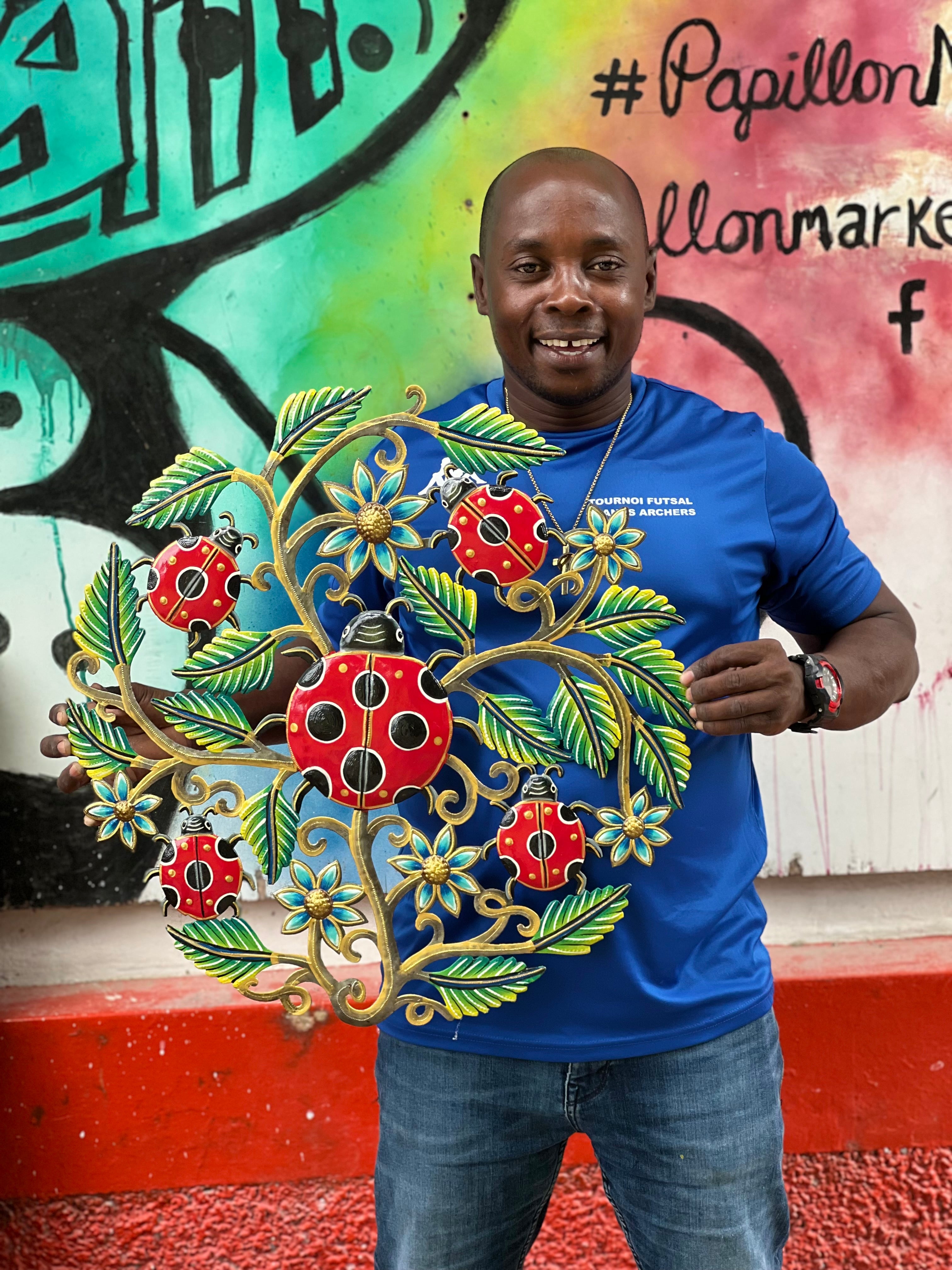 Colbert- Ladybug And Green Leaf Plant